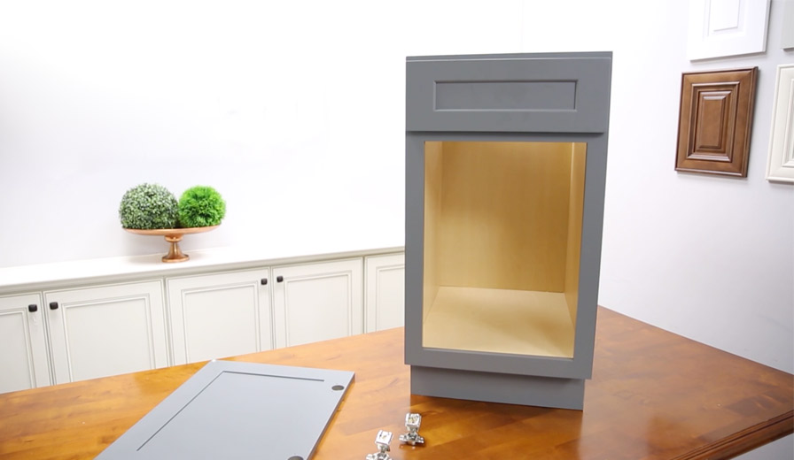 Kitchen cabinets getting assembled - click this image for our video library